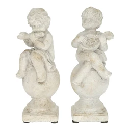 Gyerek hangszerrel, gömbön ülő 8x8x19 cm