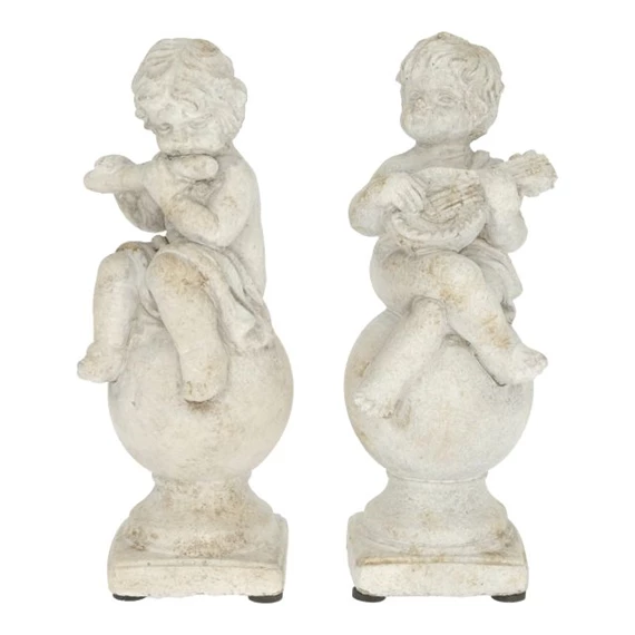 Gyerek hangszerrel, gömbön ülő 8x8x19 cm